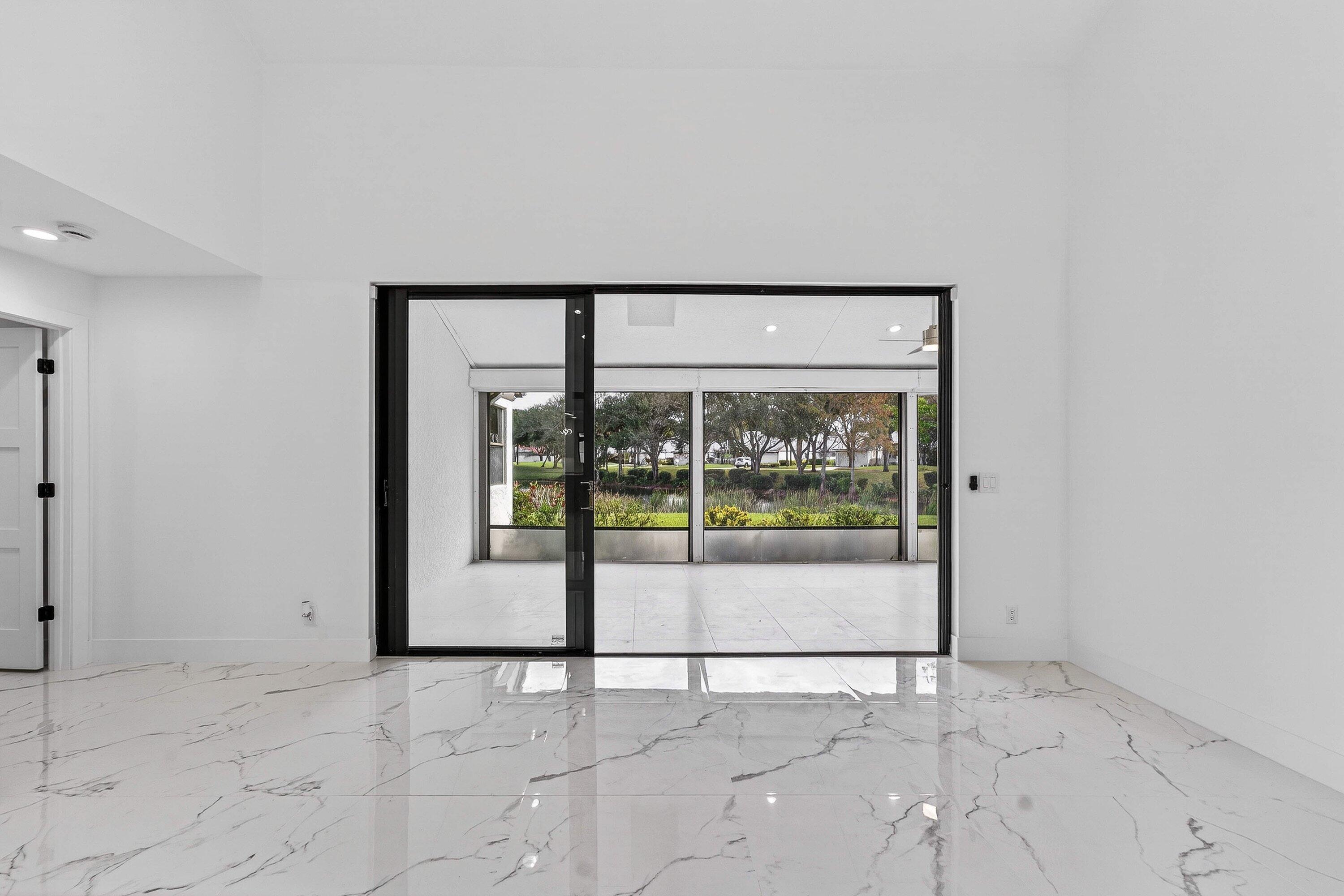 6 Clubhouse Lane Boynton Beach, FL 33436 - Photo 20 of 76 a view of an empty room with a window