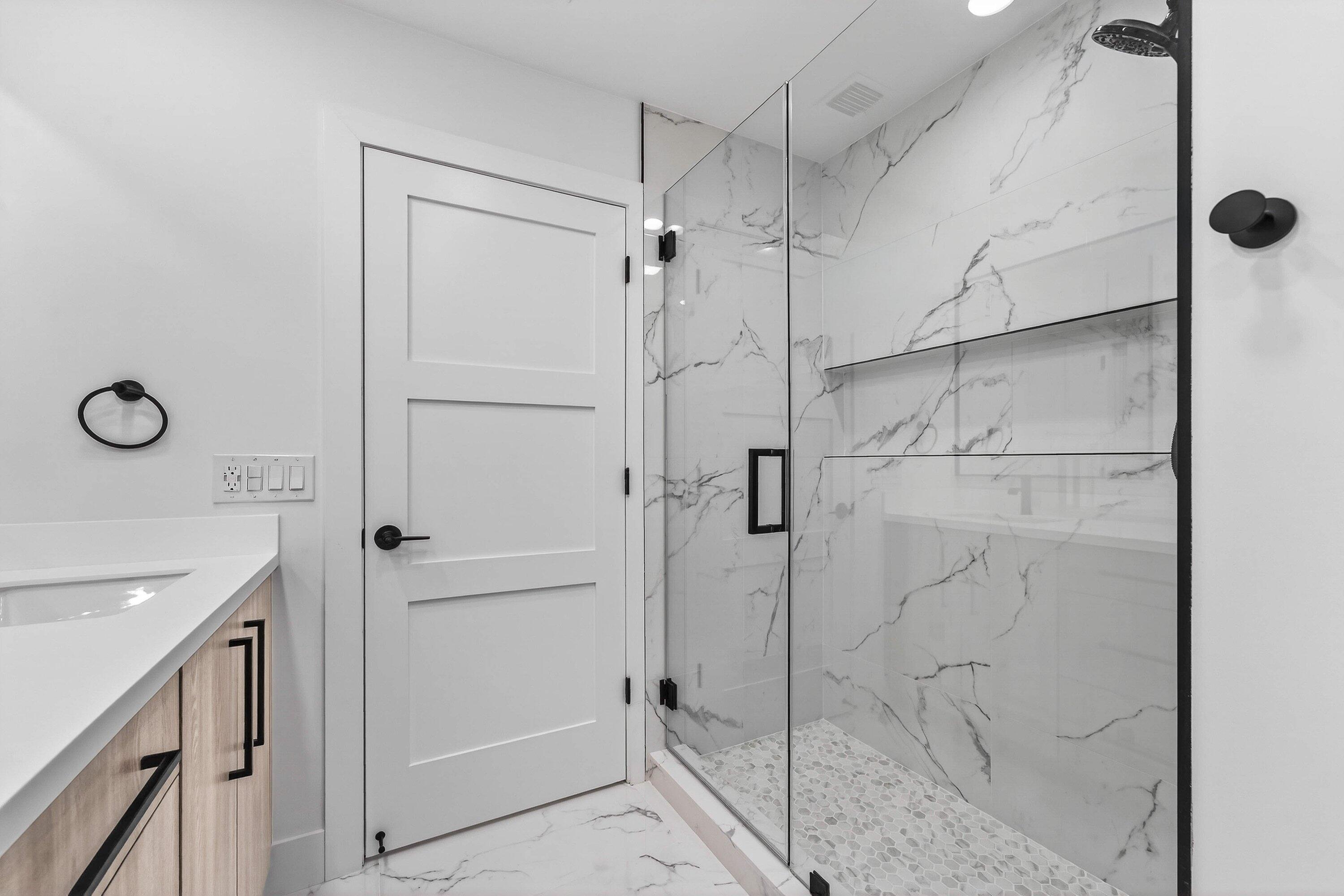 6 Clubhouse Lane Boynton Beach, FL 33436 - Photo 39 of 76 a bathroom with a shower and a sink