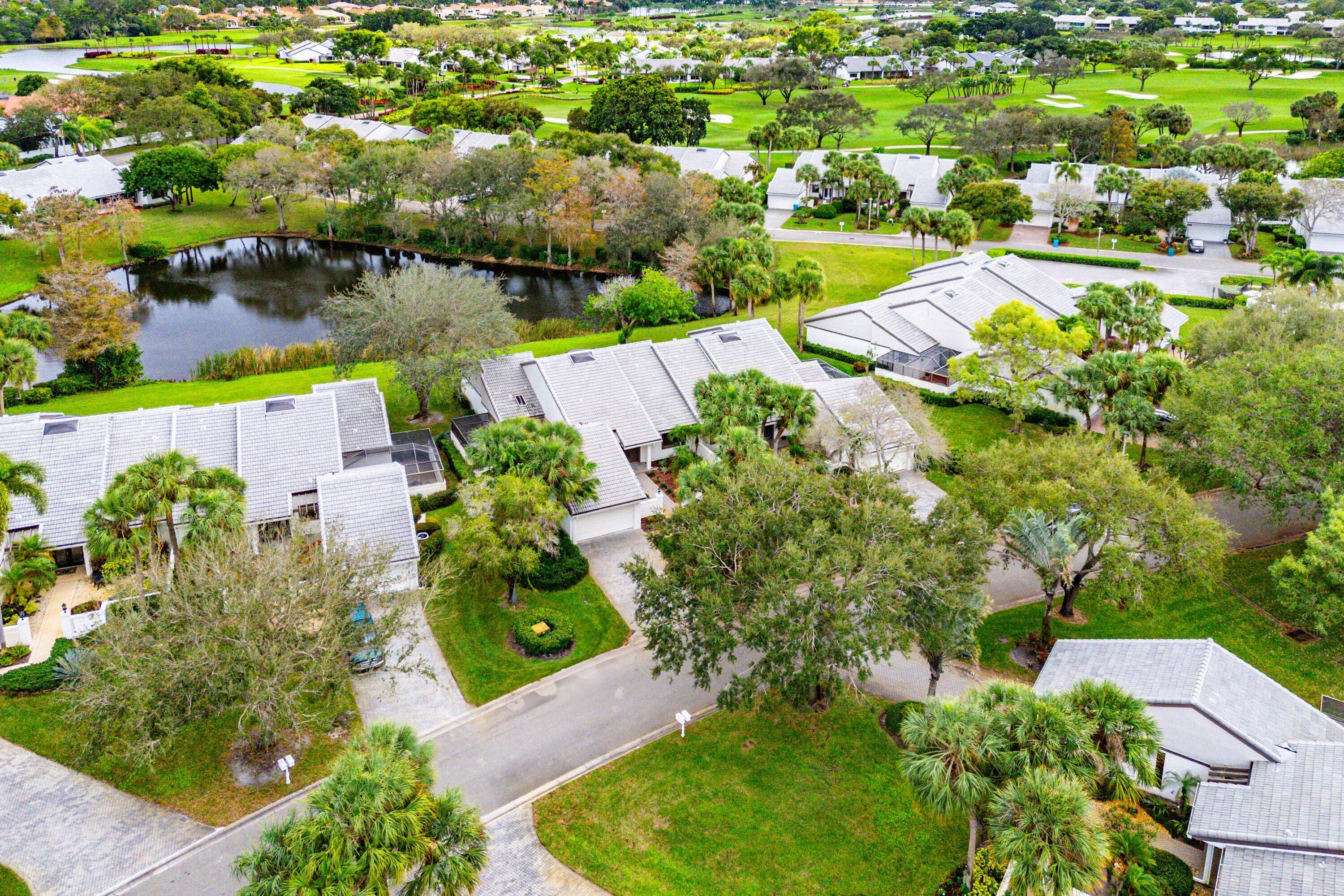 6 Clubhouse Lane Boynton Beach, FL 33436 - Photo 66 of 76 an aerial view of residential houses with outdoor space and street view