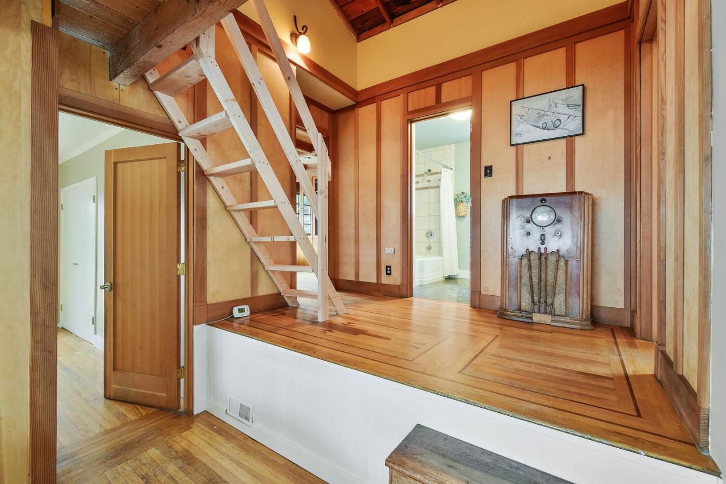 554 Brighton Road Pacifica, CA 94044 - Photo 12 of 50 a view of a hallway with wooden floor and entryway