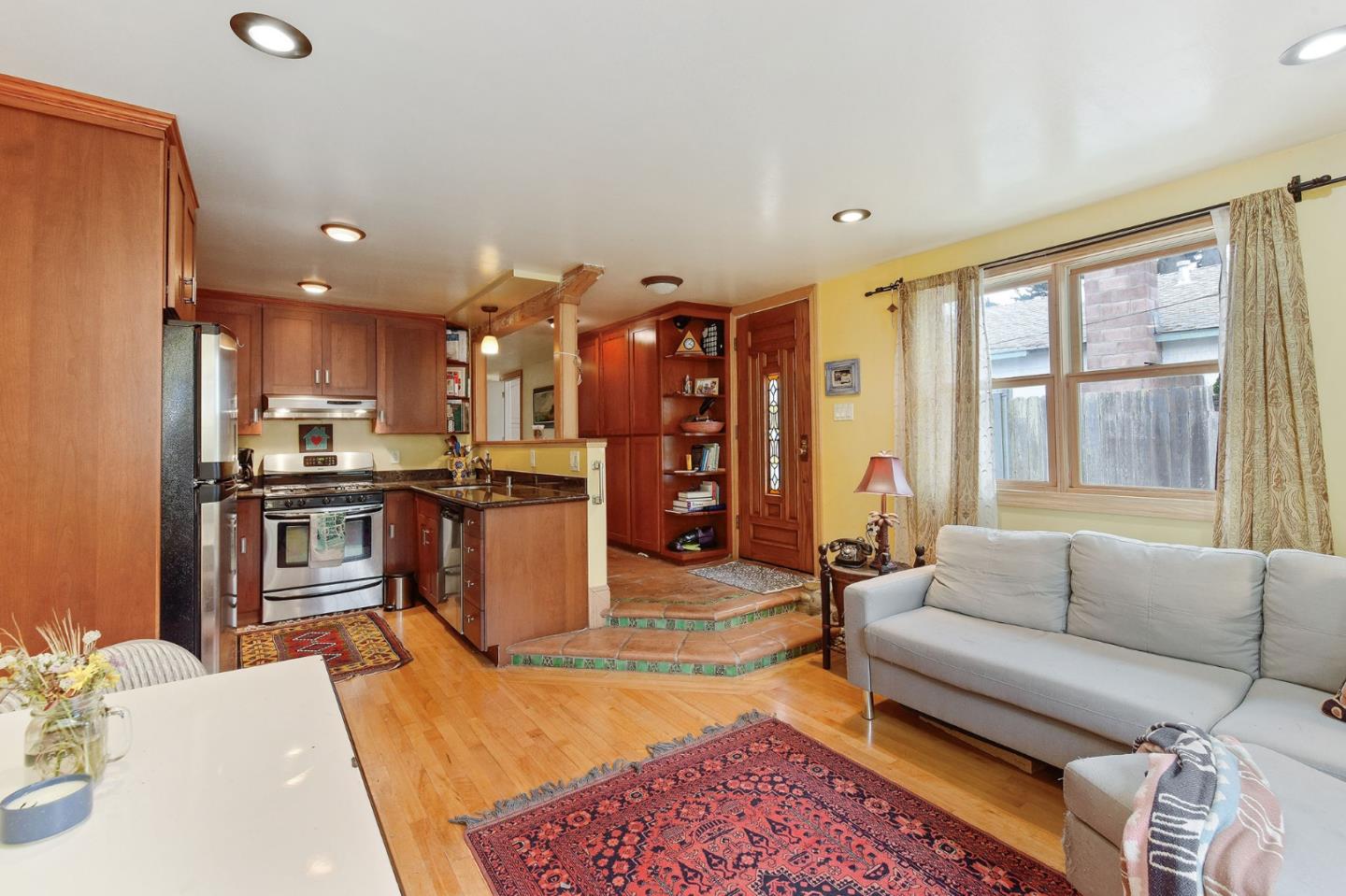 554 Brighton Road Pacifica, CA 94044 - Photo 26 of 50 a living room with furniture and a kitchen
