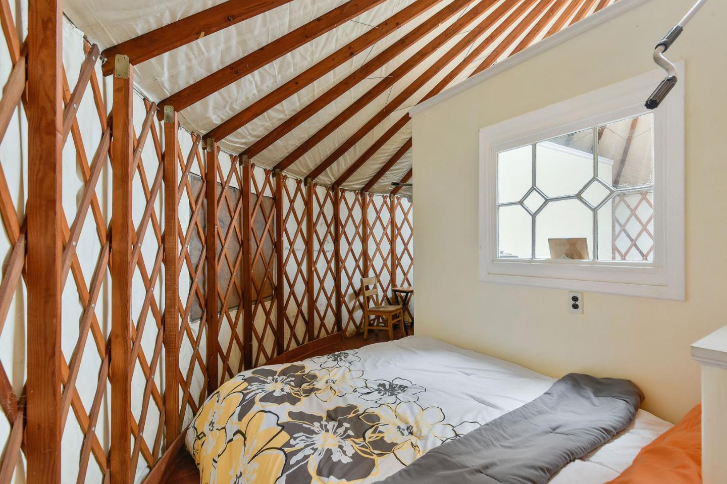 554 Brighton Road Pacifica, CA 94044 - Photo 40 of 50 a bedroom with a bed and a window