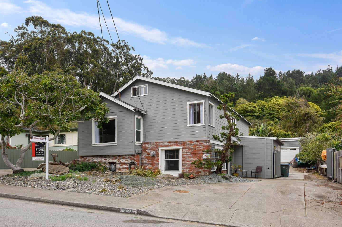 554 Brighton Road Pacifica, CA 94044 - Photo 4 of 50 a view of a house with a patio
