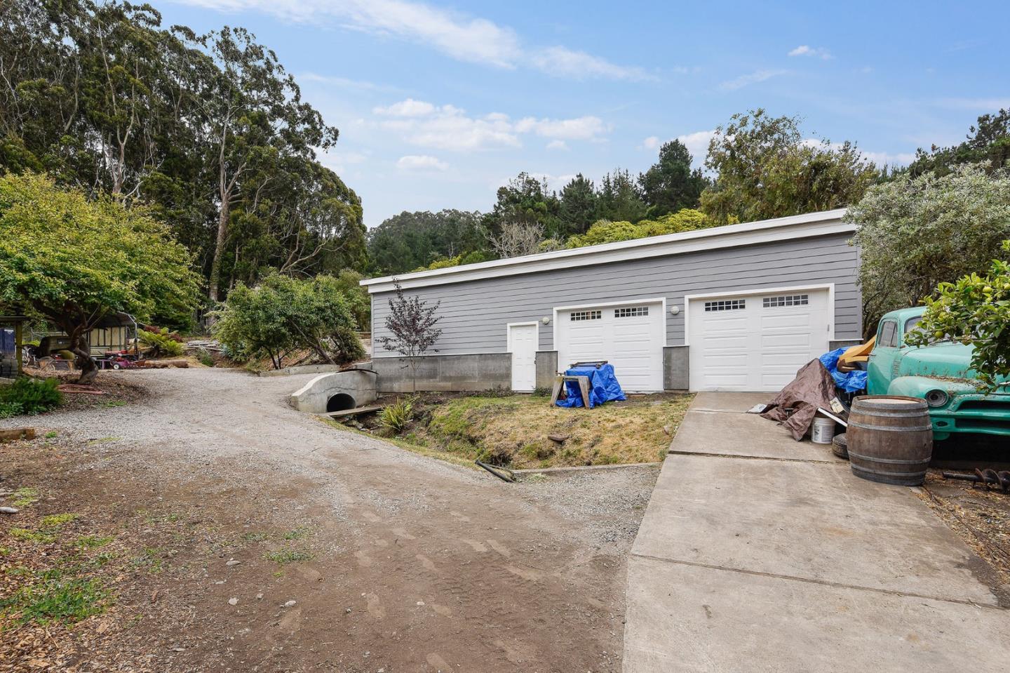 554 Brighton Road Pacifica, CA 94044 - Photo 44 of 50 a view of a house with backyard and trees