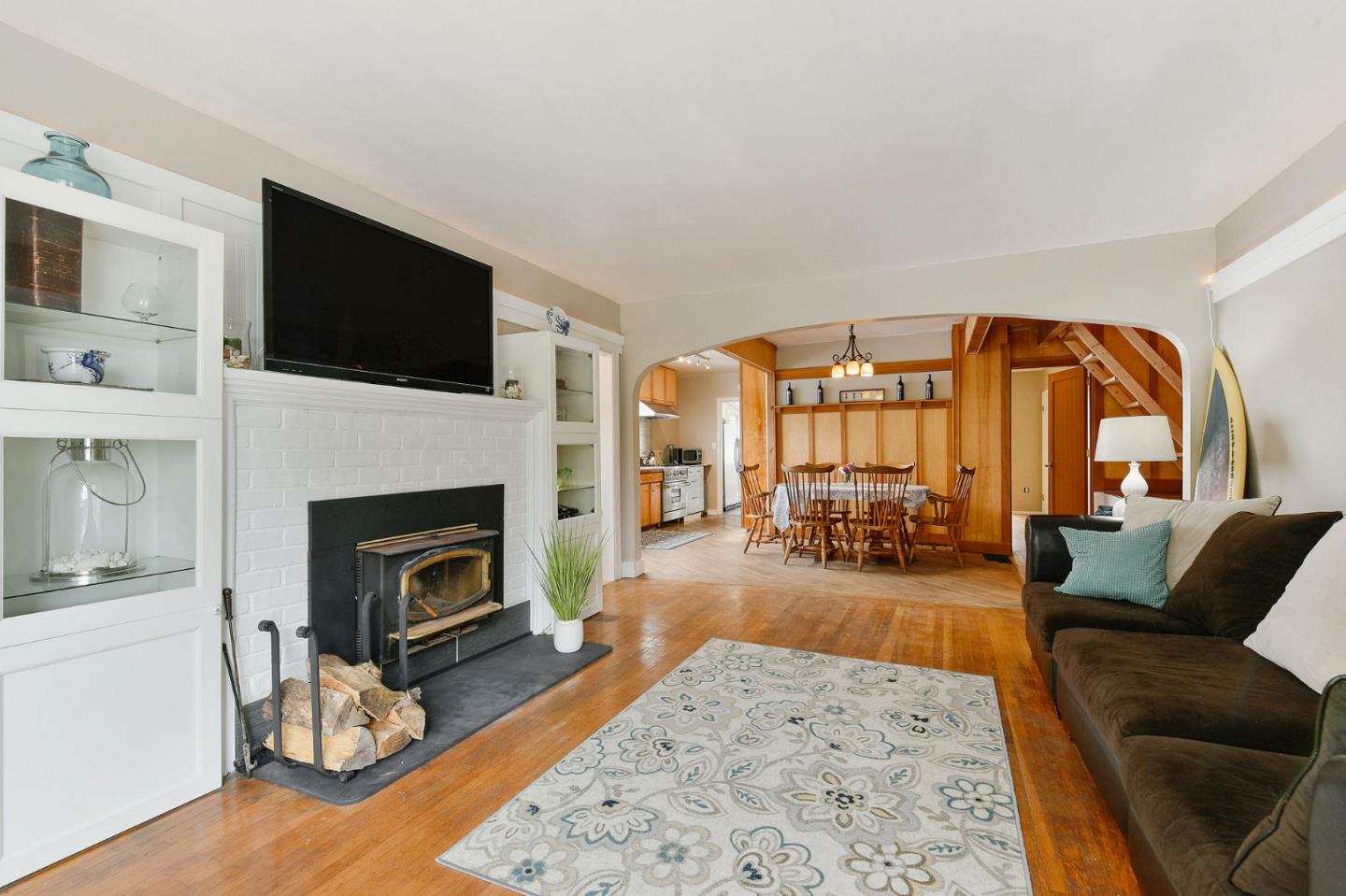 554 Brighton Road Pacifica, CA 94044 - Photo 6 of 50 a living room with furniture fireplace and flat screen tv