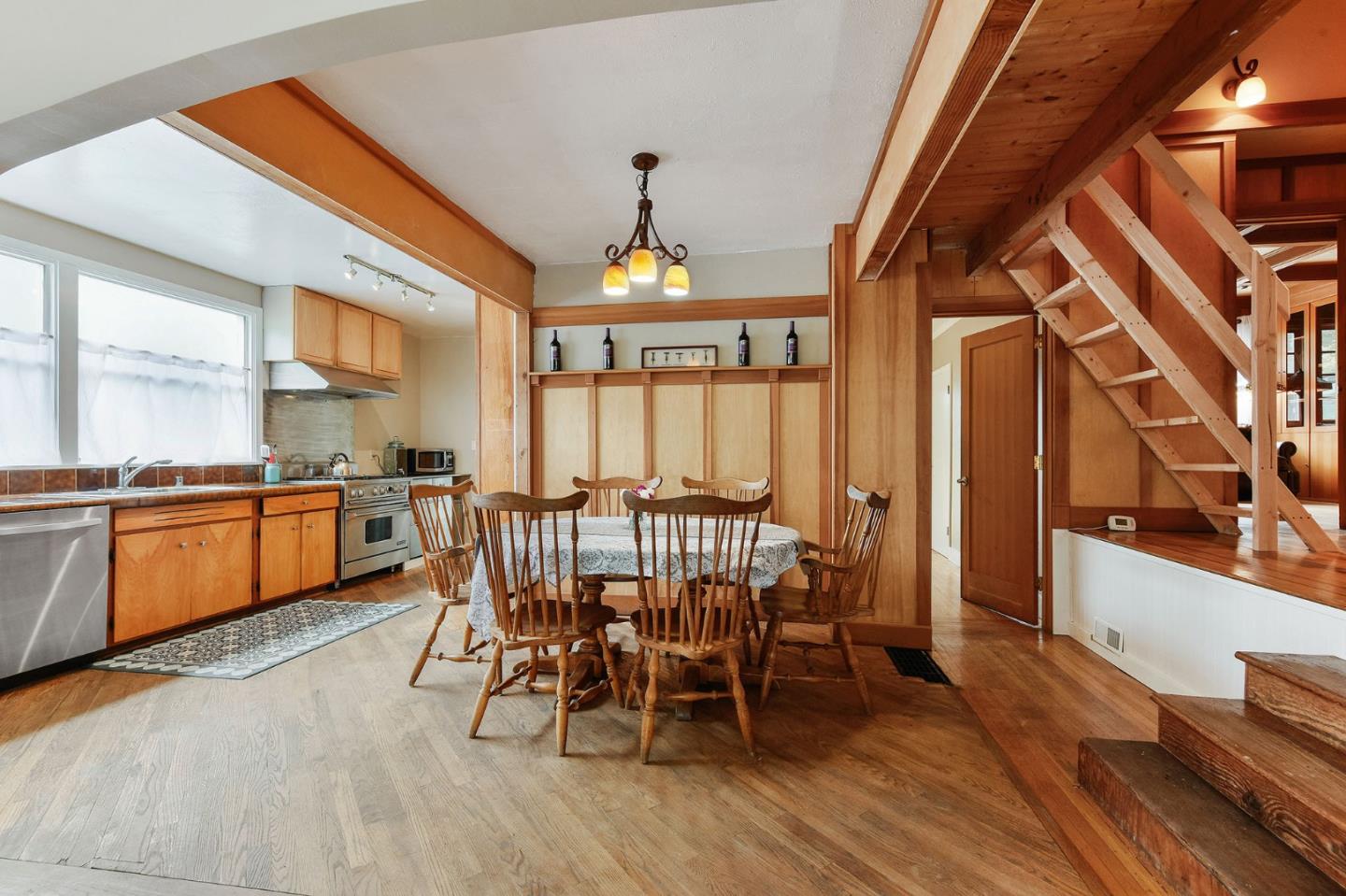 554 Brighton Road Pacifica, CA 94044 - Photo 7 of 50 a view of a dining room with furniture window and wooden floor