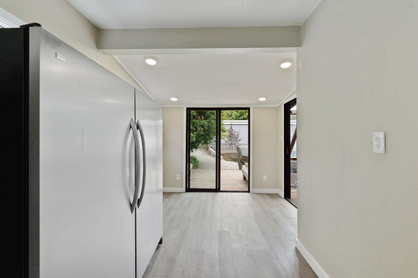 554 Brighton Road Pacifica, CA 94044 - Photo 9 of 50 a view of entryway with wooden floor