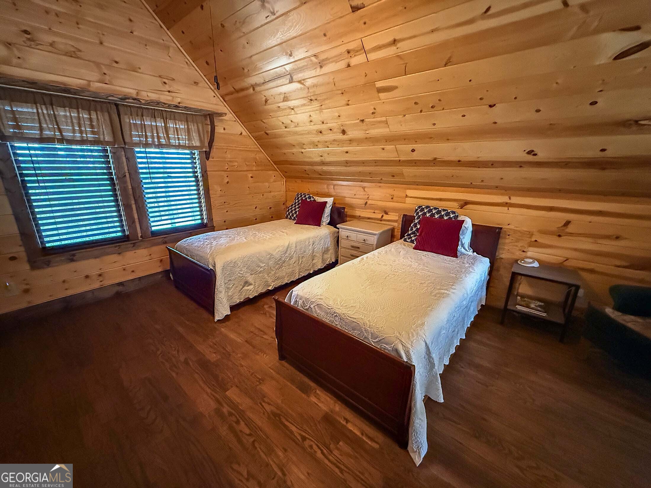 513 Coleman Heights Lane Rabun Gap, GA 30568 - Photo 12 of 36 a bedroom with two beds and painted walls