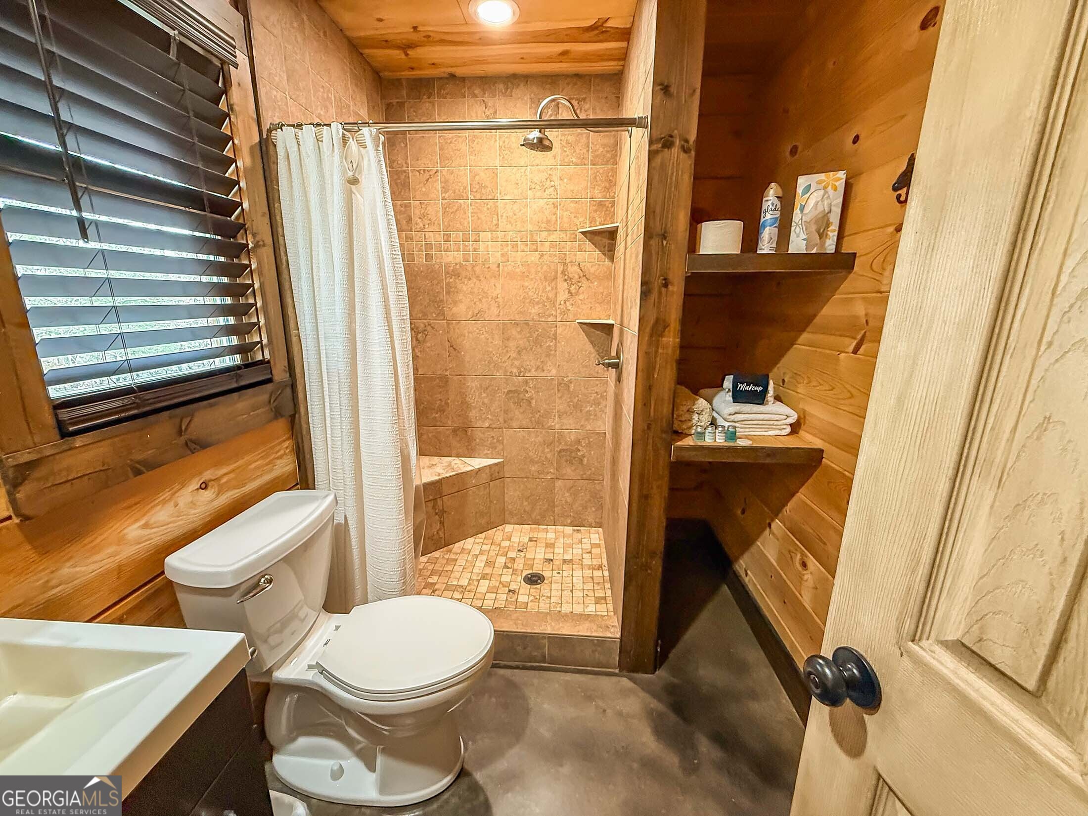 513 Coleman Heights Lane Rabun Gap, GA 30568 - Photo 30 of 36 a bathroom with a toilet and a shower