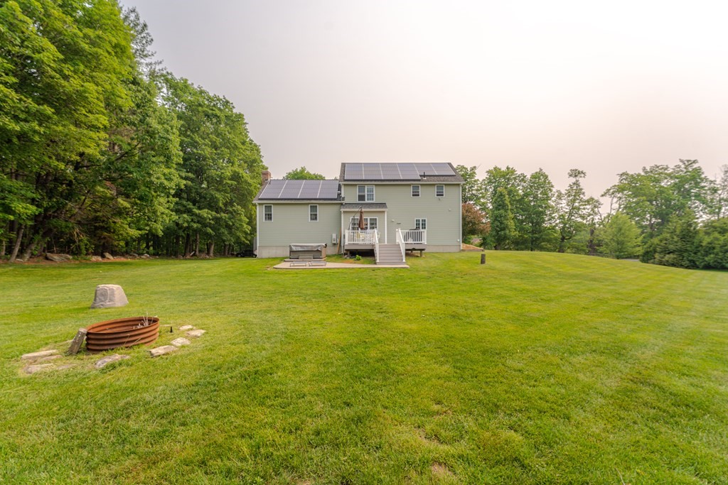 81 Ridge Road Rutland, MA 01543 - Photo 12 of 41 a view of a big yard with large trees