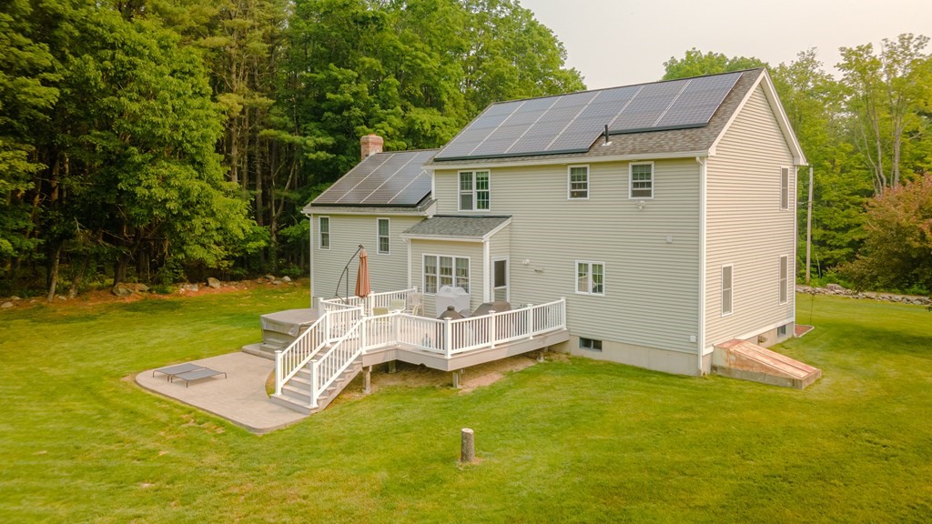 81 Ridge Road Rutland, MA 01543 - Photo 8 of 41 a view of a house with a yard balcony and slide