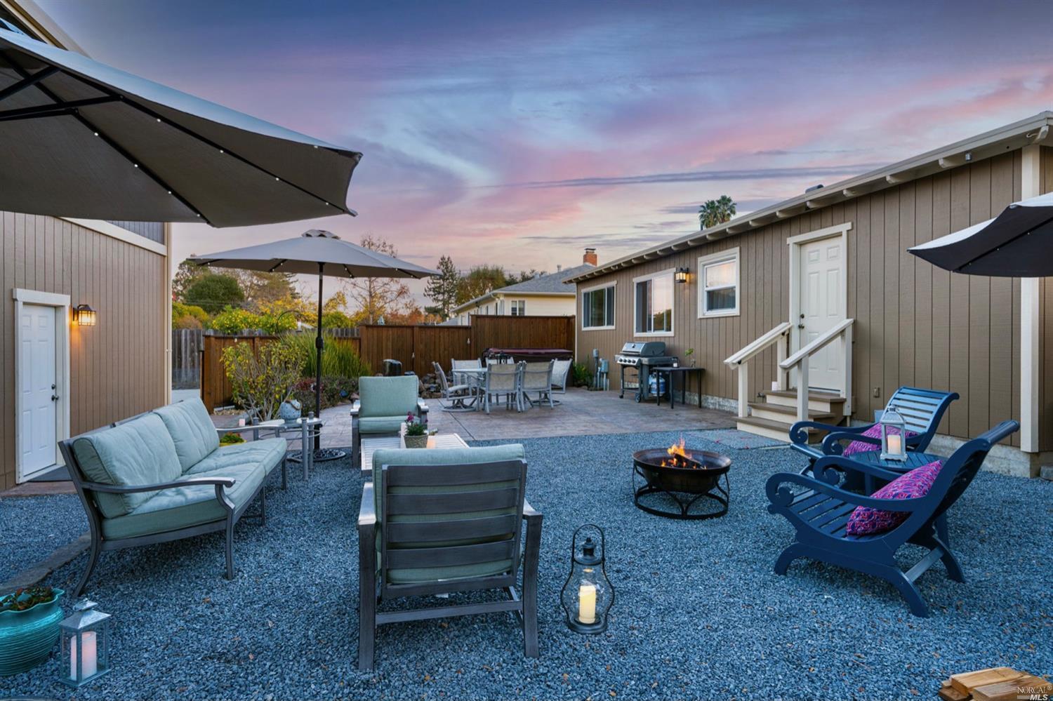 2188 Center Road Novato, CA 94947 - Photo 1 of 1 a living room with patio furniture and a potted plant