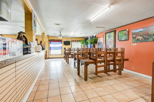 a white refrigerator freezer sitting inside of a kitchen