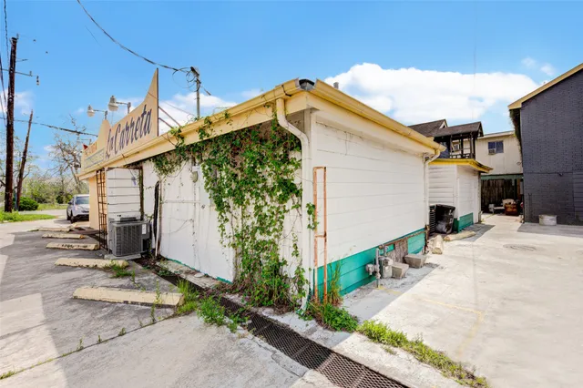 a view of a car park in front of a building