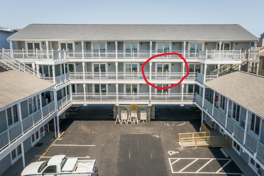449 Ocean Boulevard, Unit 305 Hampton, NH 03842 - Photo 4 of 28 a view of a balcony with a deck