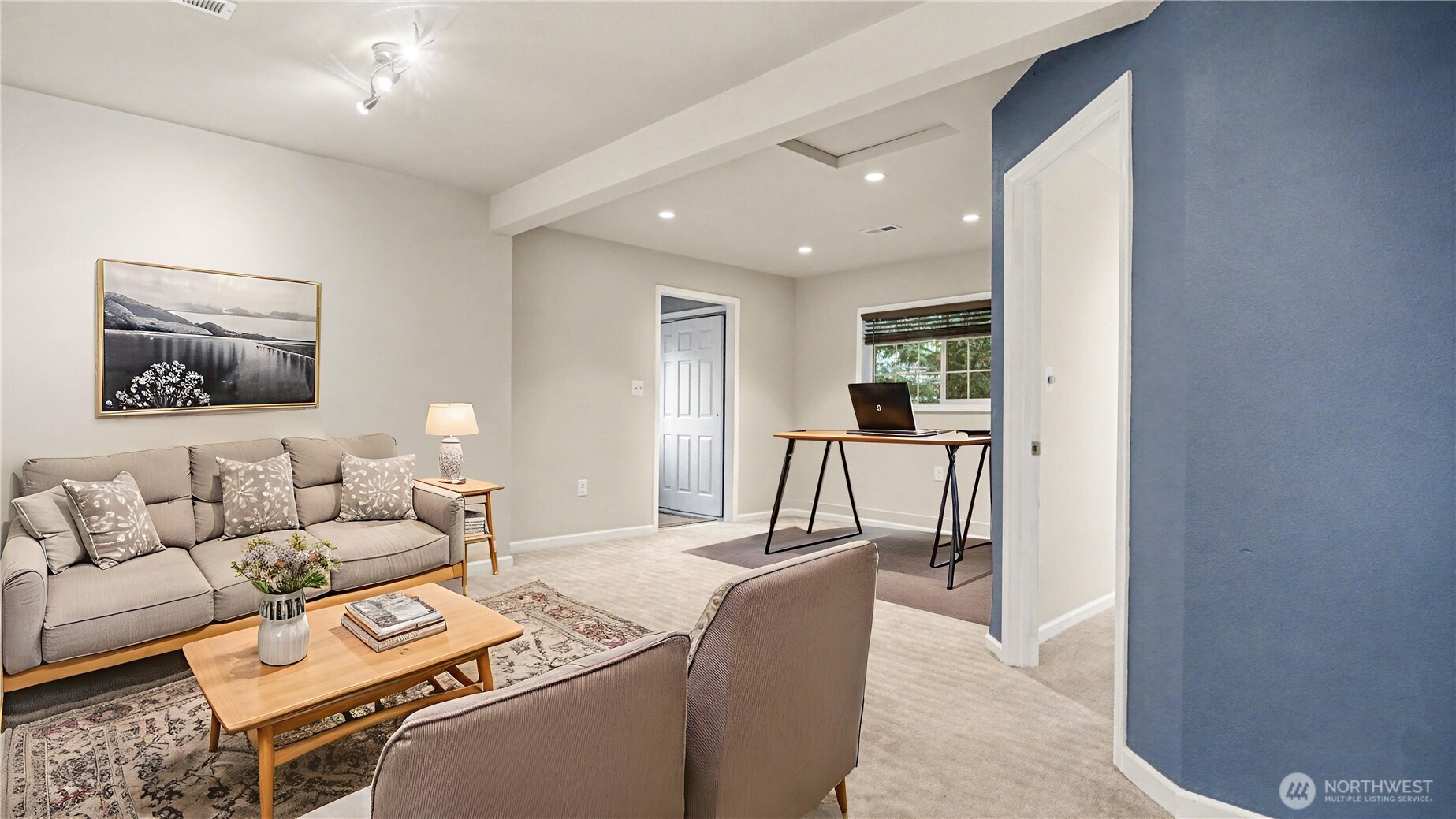 6201 Island Crest Way Mercer Island, WA 98040 - Photo 12 of 40 a living room with furniture and a table