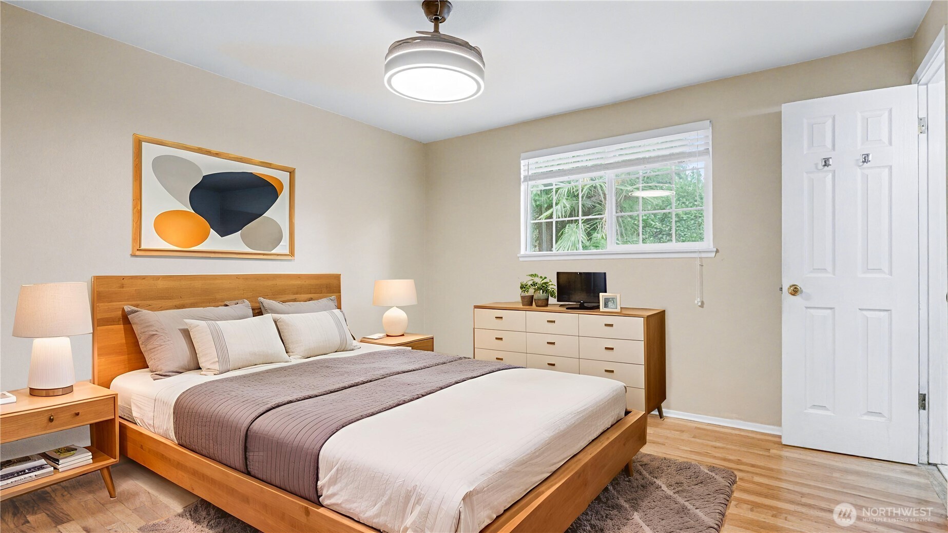 6201 Island Crest Way Mercer Island, WA 98040 - Photo 16 of 40 a bedroom with a bed and a window