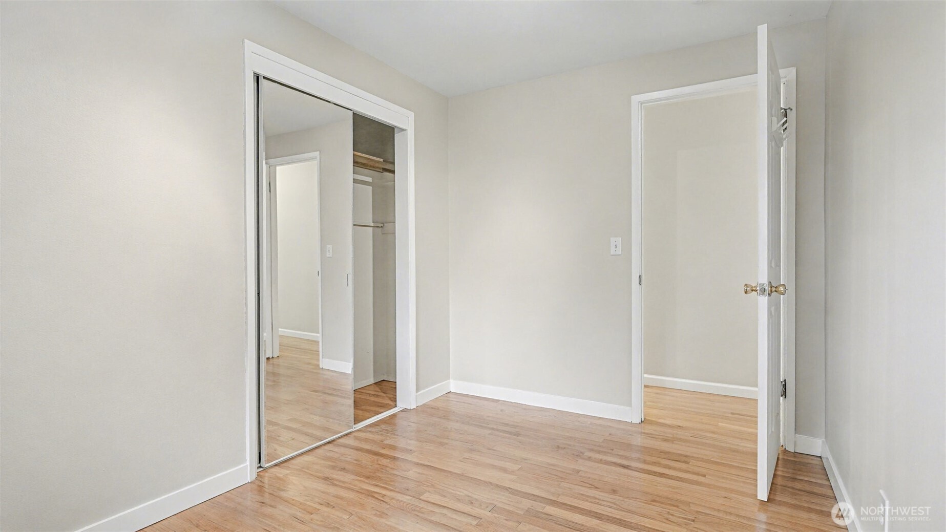 6201 Island Crest Way Mercer Island, WA 98040 - Photo 20 of 40 a view of a room with wooden floor