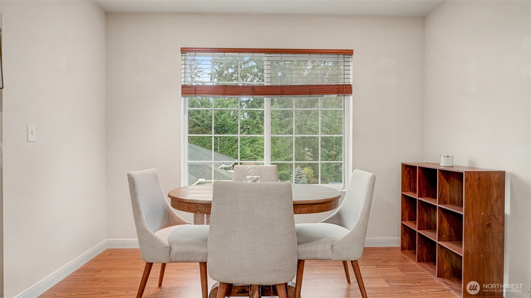 6201 Island Crest Way Mercer Island, WA 98040 - Photo 30 of 40 a view of a dining room with furniture window and wooden floor