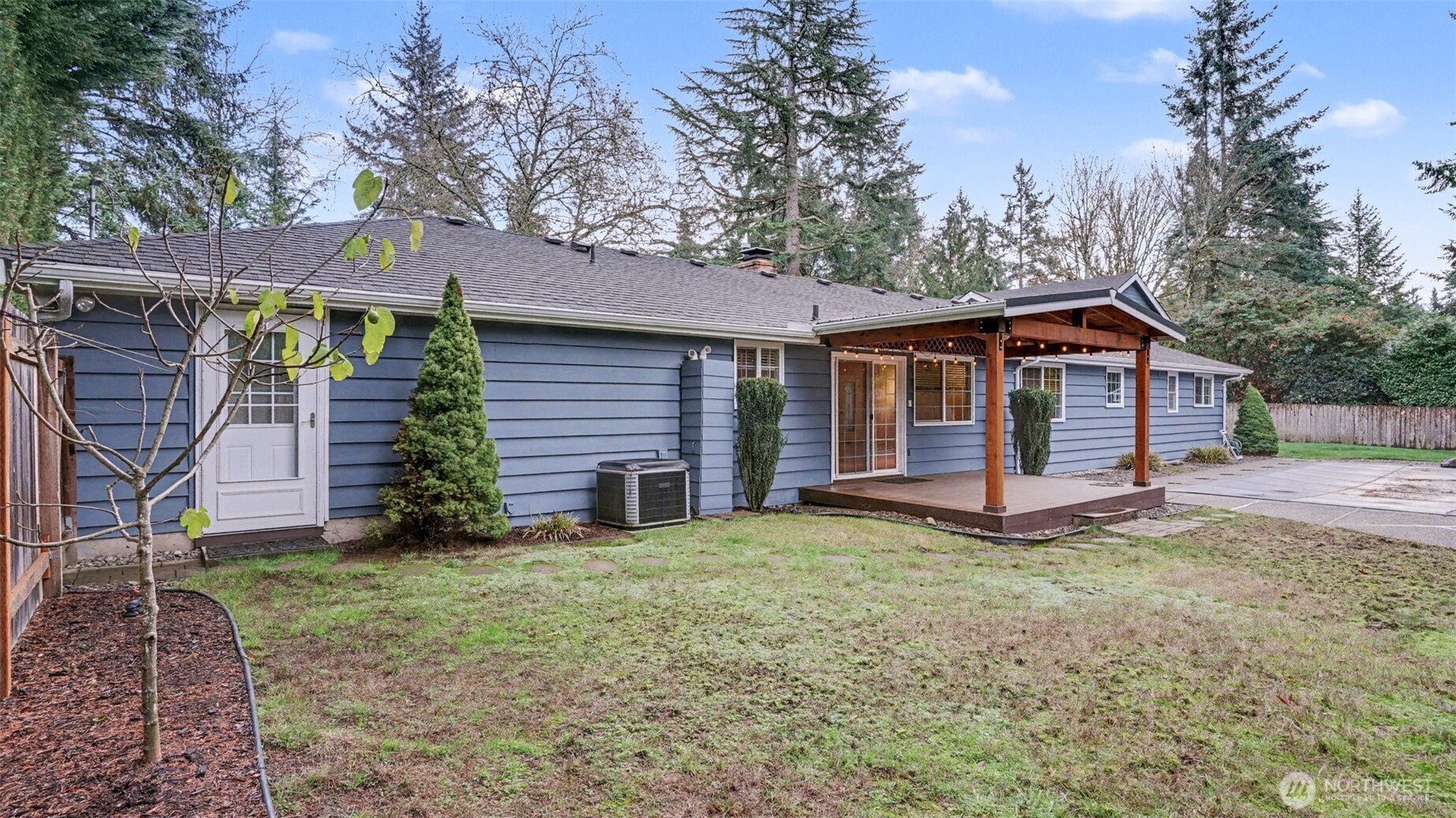 6201 Island Crest Way Mercer Island, WA 98040 - Photo 33 of 40 a view of a house with a yard and large tree