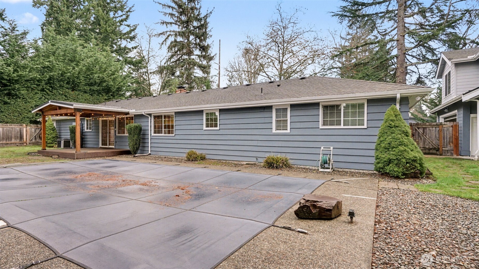 6201 Island Crest Way Mercer Island, WA 98040 - Photo 35 of 40 a view of a house with a patio