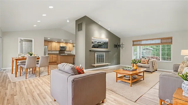 a living room with furniture and a table