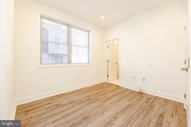 a bathroom with a sink toilet and vanity