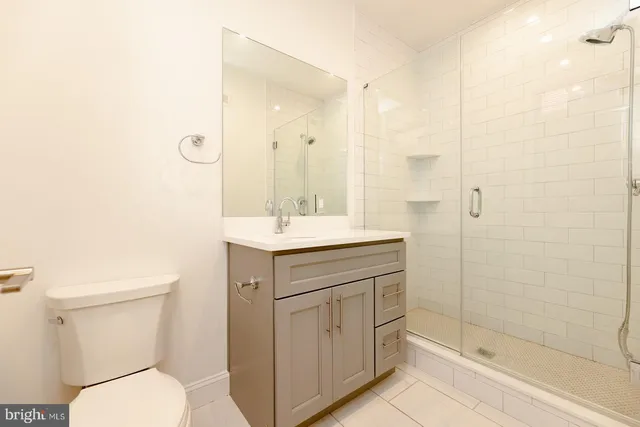 an empty room with wooden floor