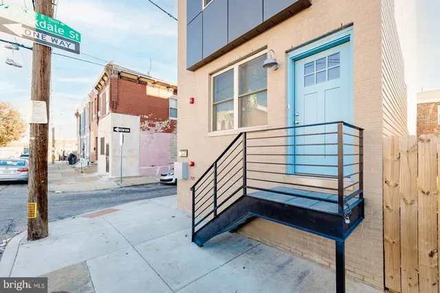 a view of an entryway with stairs