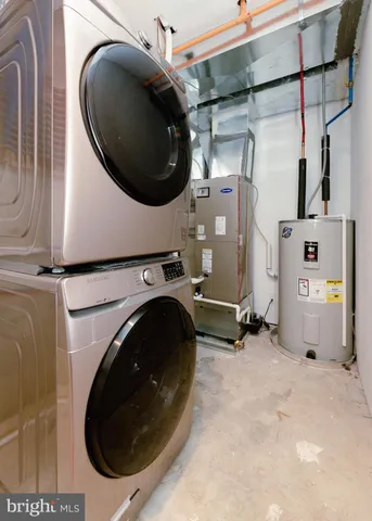 a bathroom with a double vanity sink toilet mirror and shower