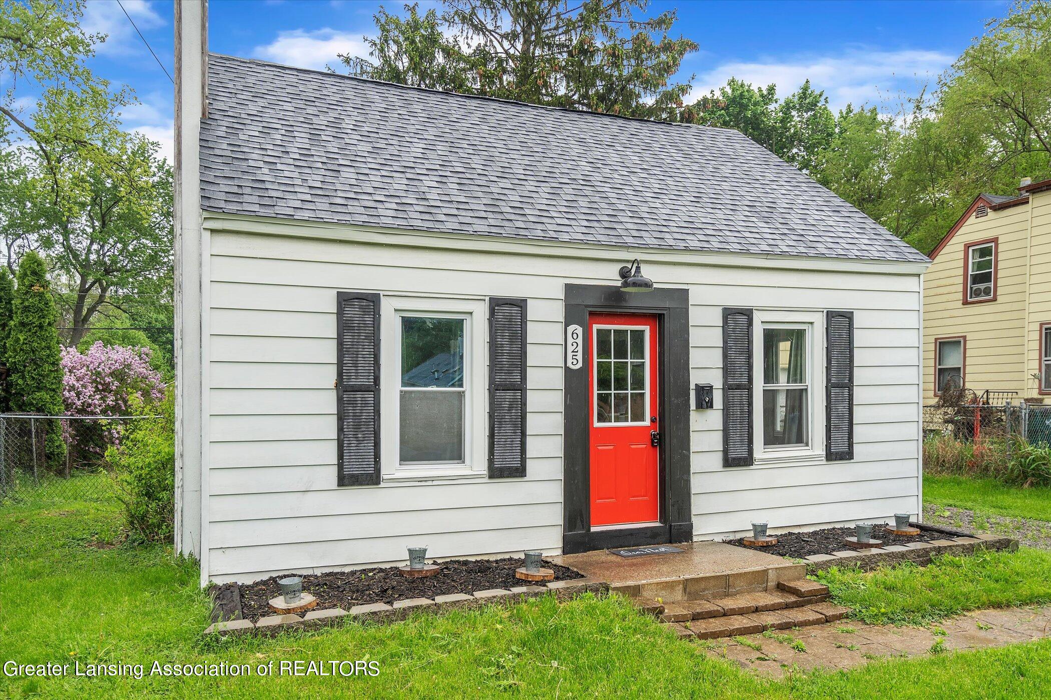 625 East Cavanaugh Road Lansing, MI 48910 - Photo 2 of 28 02-625-E-Cavanaugh-Rd-WindowStill-Real-E