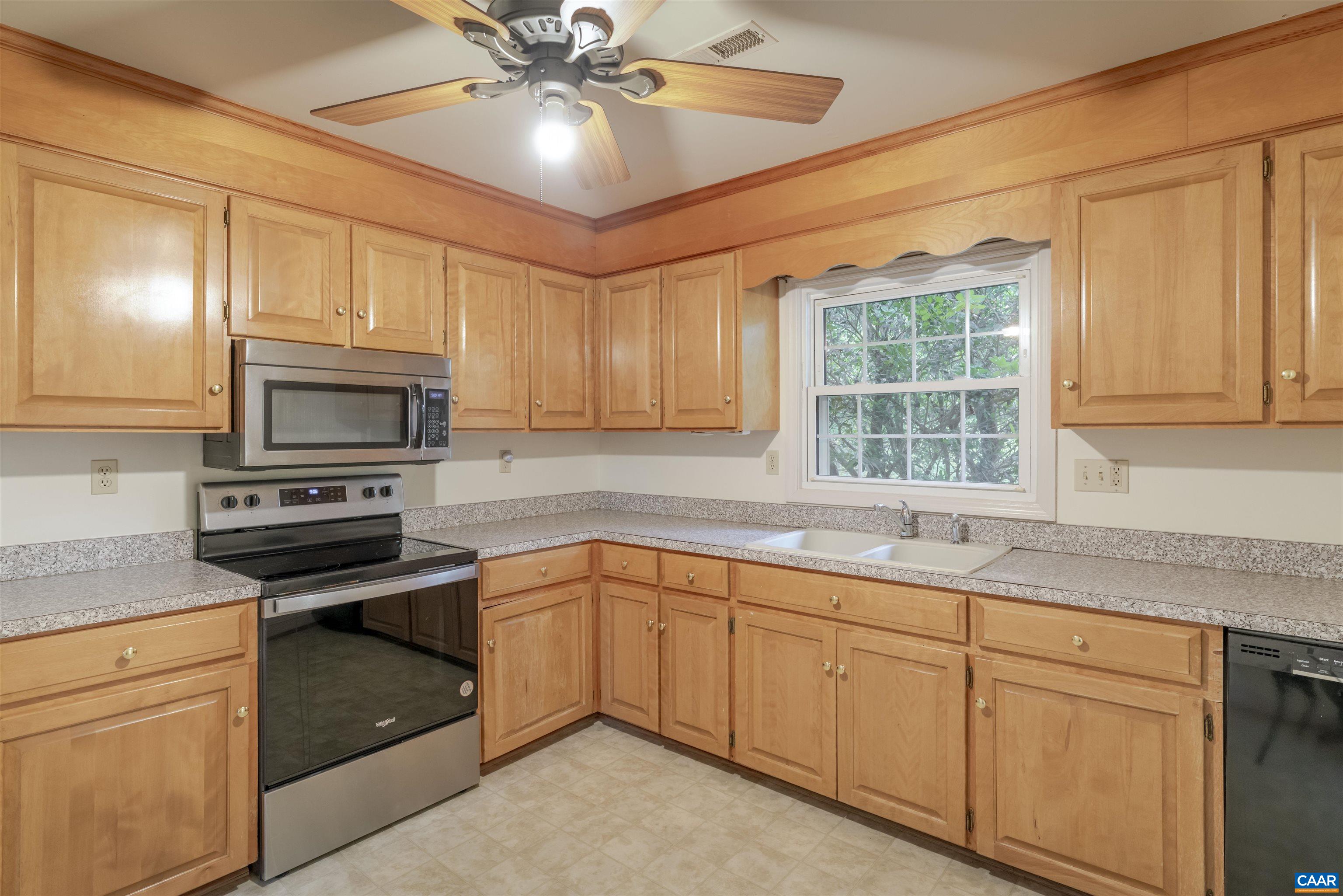 1813 Stony Point Road Charlottesville, VA 22911 - Photo 13 of 40 a kitchen with granite countertop cabinets stainless steel appliances and a sink