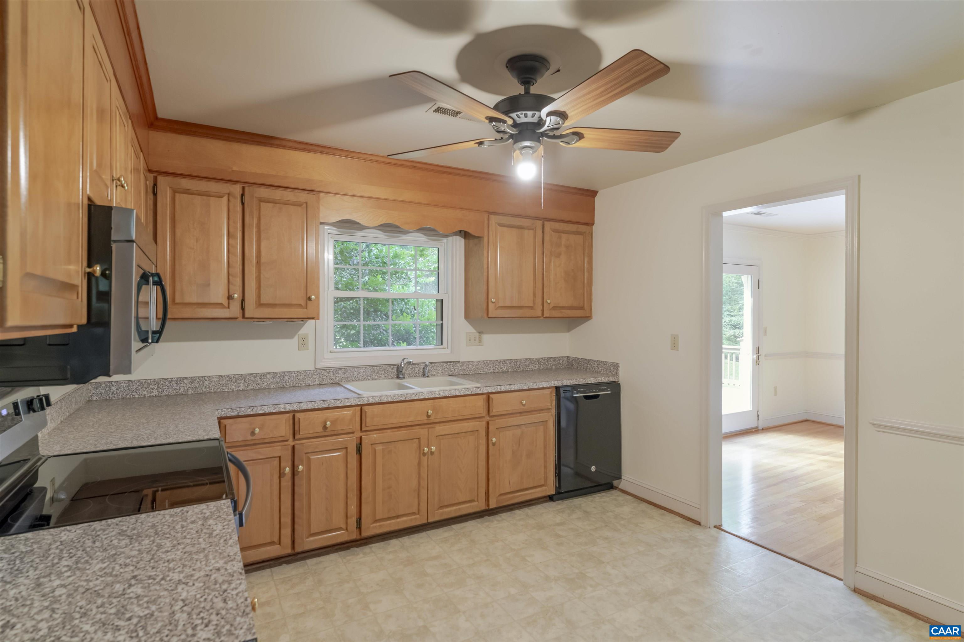 1813 Stony Point Road Charlottesville, VA 22911 - Photo 14 of 40 a kitchen with a refrigerator and a sink