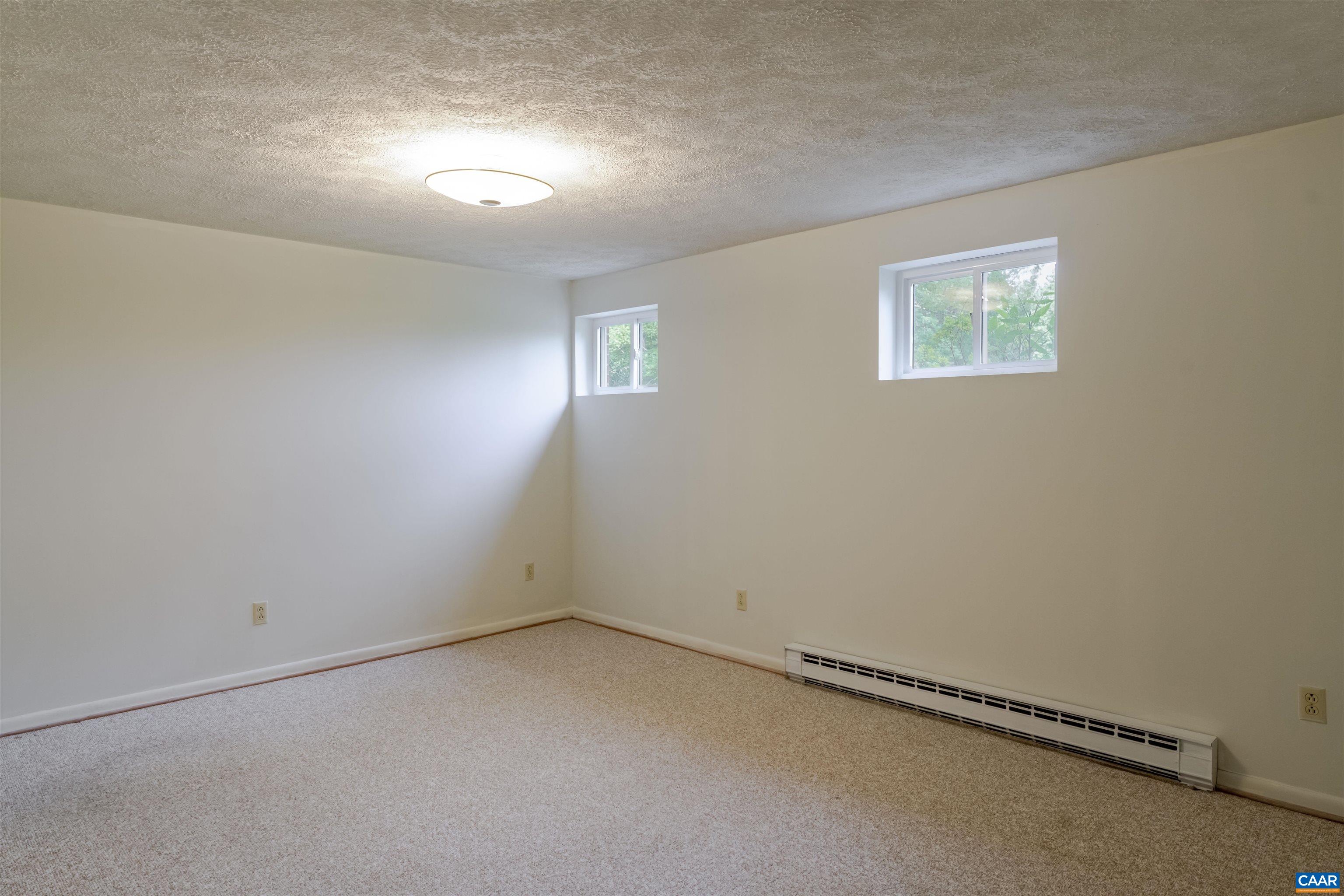 1813 Stony Point Road Charlottesville, VA 22911 - Photo 29 of 40 an empty room with a workbench