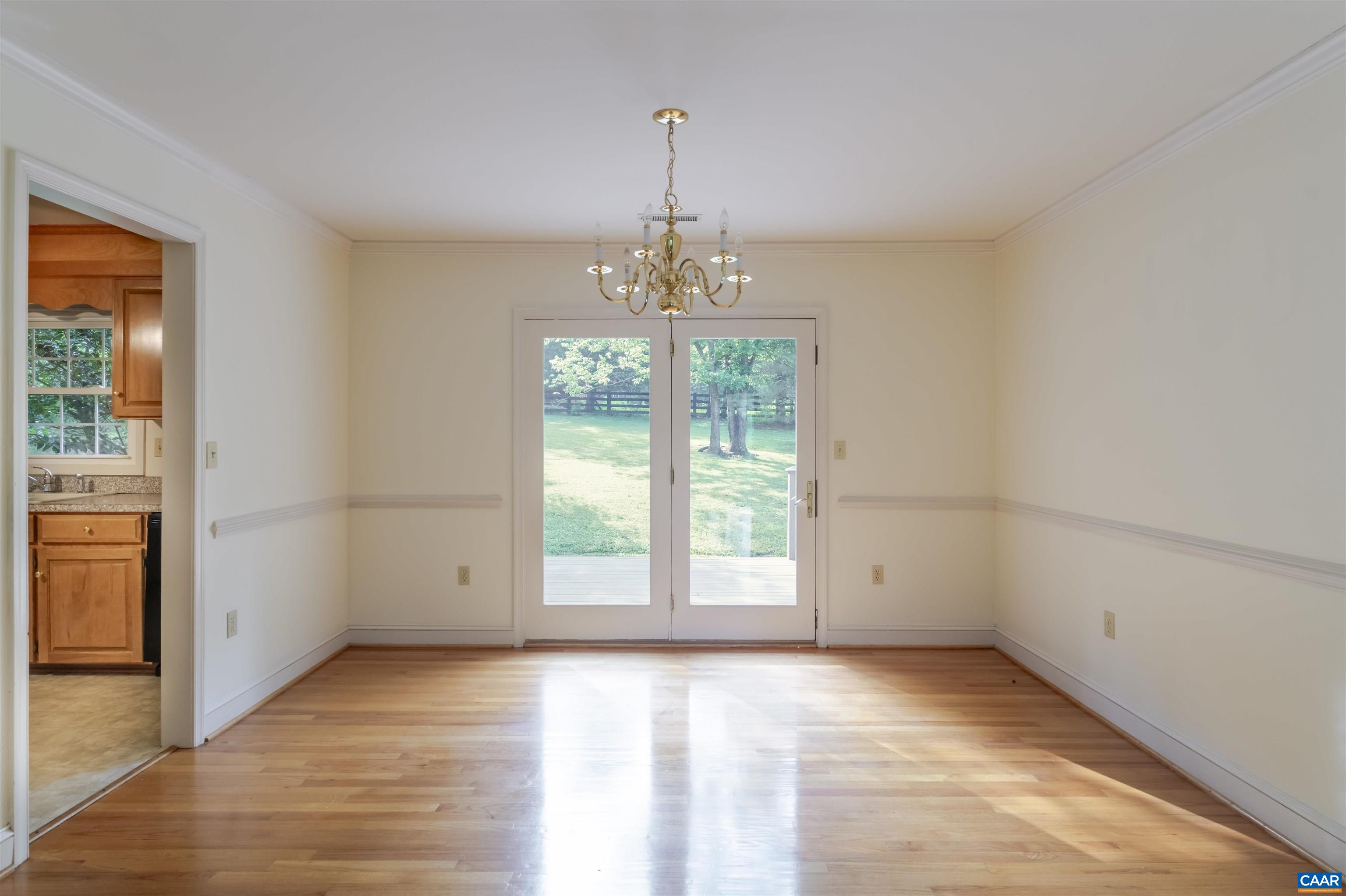 1813 Stony Point Road Charlottesville, VA 22911 - Photo 10 of 40 an empty room with windows and entrance