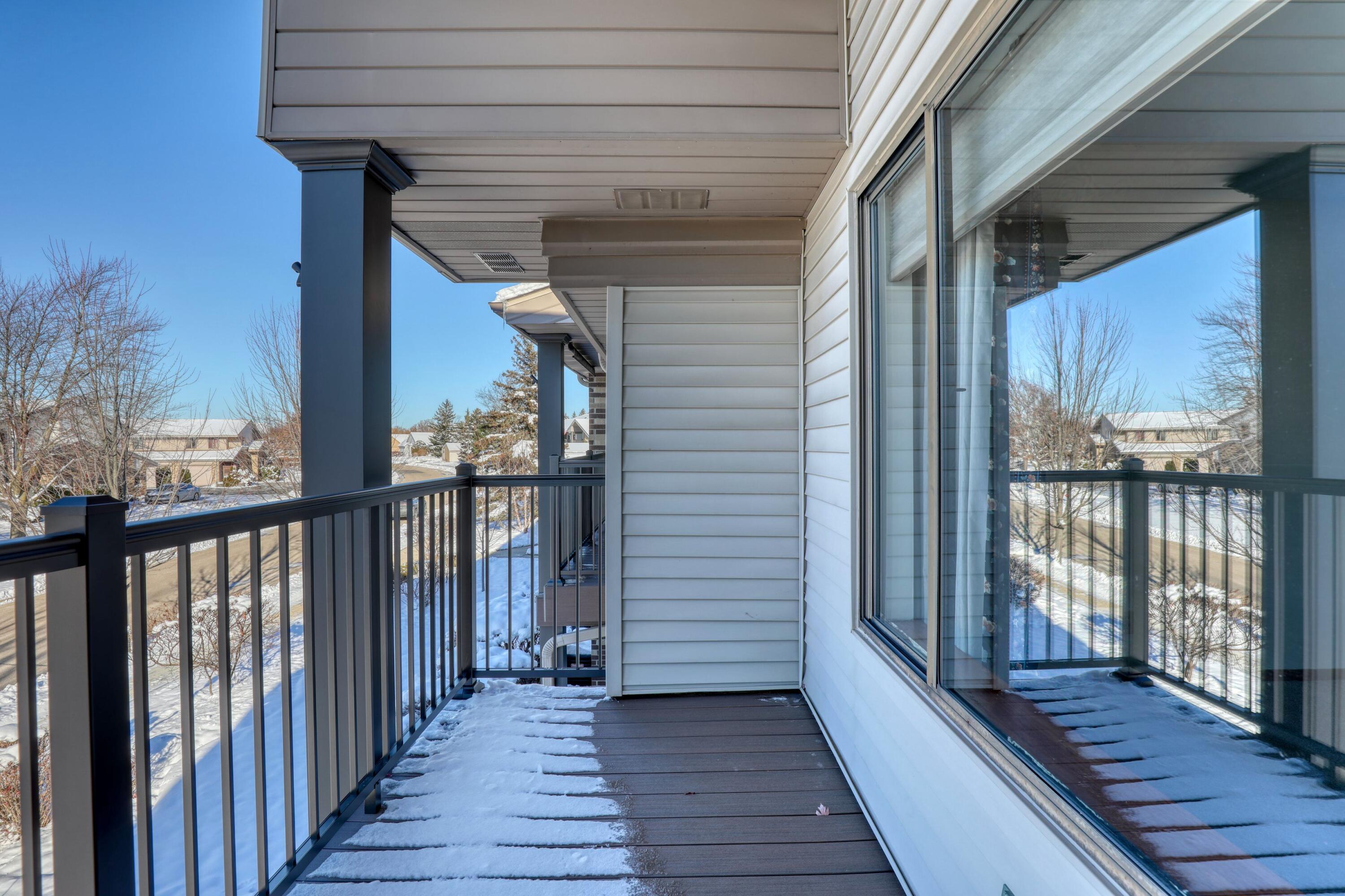 W176N9734 Riversbend Circle East Germantown, WI 53022 - Photo 19 of 27 New decking on balcony