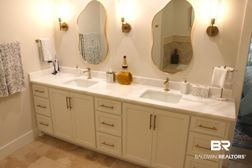 18269 Colony Drive, Unit 803 Fairhope, AL 36532 - Photo 9 of 27 Bathroom featuring double vanity and baseboards