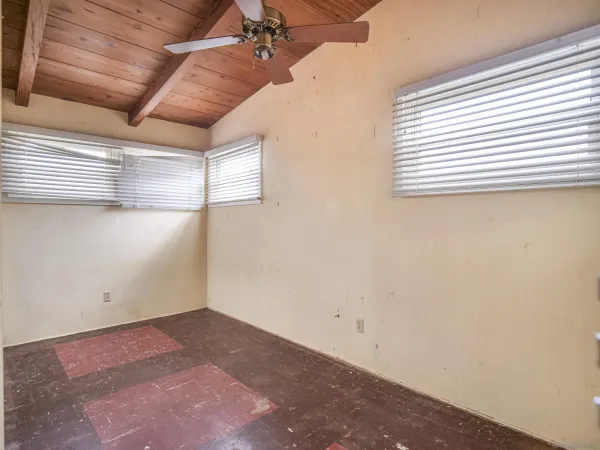 an empty room with windows