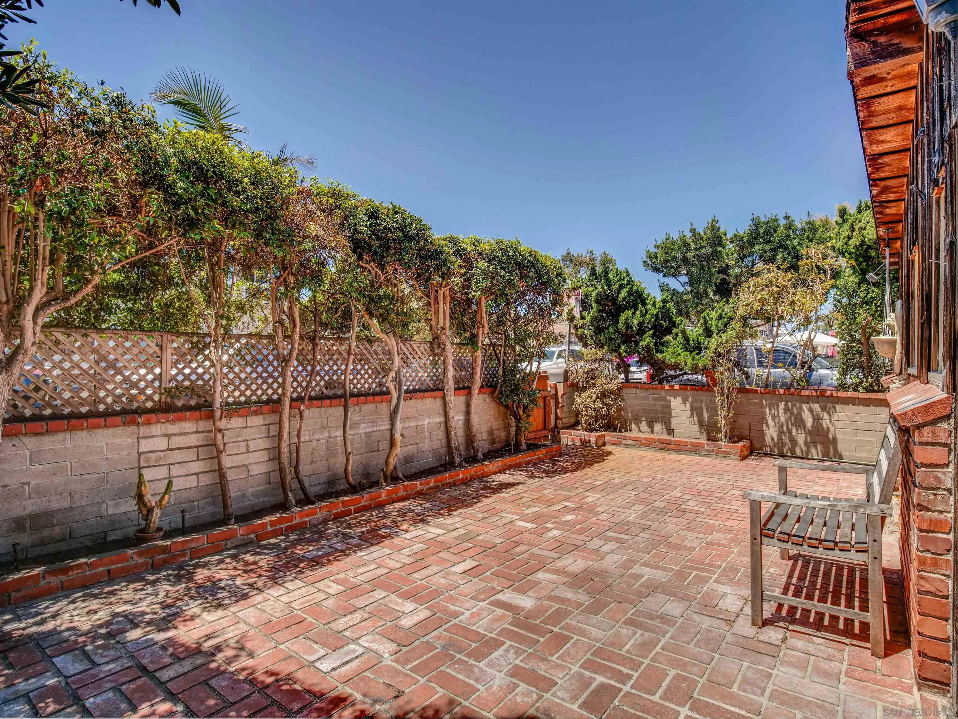 818-820 San Luis Rey Place San Diego, CA 92109 - Photo 5 of 40 a view of a backyard with sitting area