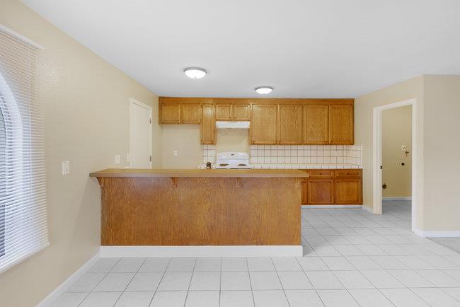 6790 Filbro Drive Gilroy, CA 95020 - Photo 12 of 42 a bathroom with a sink a vanity and a mirror