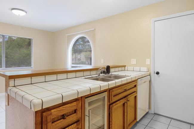 6790 Filbro Drive Gilroy, CA 95020 - Photo 17 of 42 a bedroom with a sink and a mirror