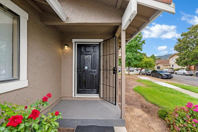 6790 Filbro Drive Gilroy, CA 95020 - Photo 2 of 42 a front view of a house with flower garden