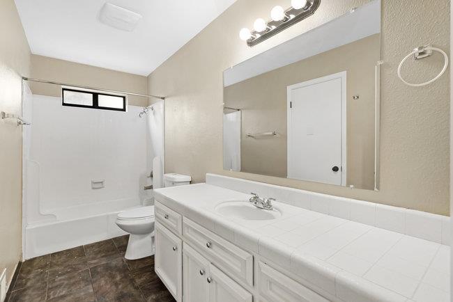6790 Filbro Drive Gilroy, CA 95020 - Photo 22 of 42 a bathroom with a sink double vanity granite tub and shower