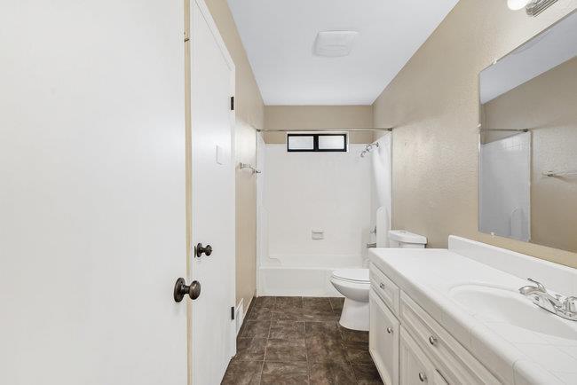 6790 Filbro Drive Gilroy, CA 95020 - Photo 28 of 42 a bathroom with a sink a toilet and shower
