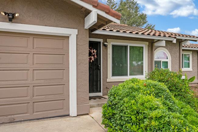 6790 Filbro Drive Gilroy, CA 95020 - Photo 33 of 42 front view of a house with a large window and potted plants