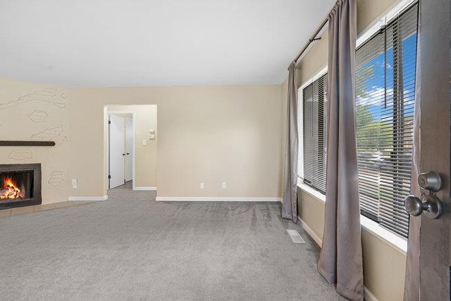 6790 Filbro Drive Gilroy, CA 95020 - Photo 6 of 42 a view of an empty room with a fireplace