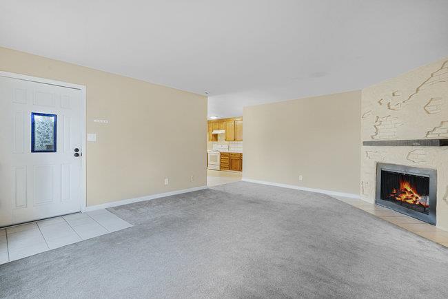 6790 Filbro Drive Gilroy, CA 95020 - Photo 9 of 42 a view of an empty room with a fireplace