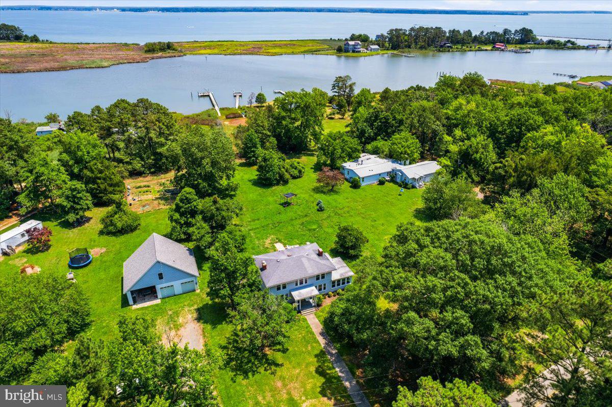 16146 Thomas Road Piney Point, MD 20674 - Photo 69 of 70 an aerial view of a house with garden space and outdoor seating