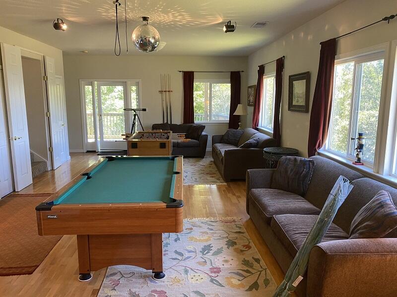 1050 Spring Road Shelter Cove, CA 95589 - Photo 41 of 42 a living room with furniture and a window