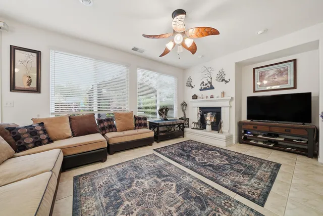 a kitchen with stainless steel appliances granite countertop a stove and a refrigerator